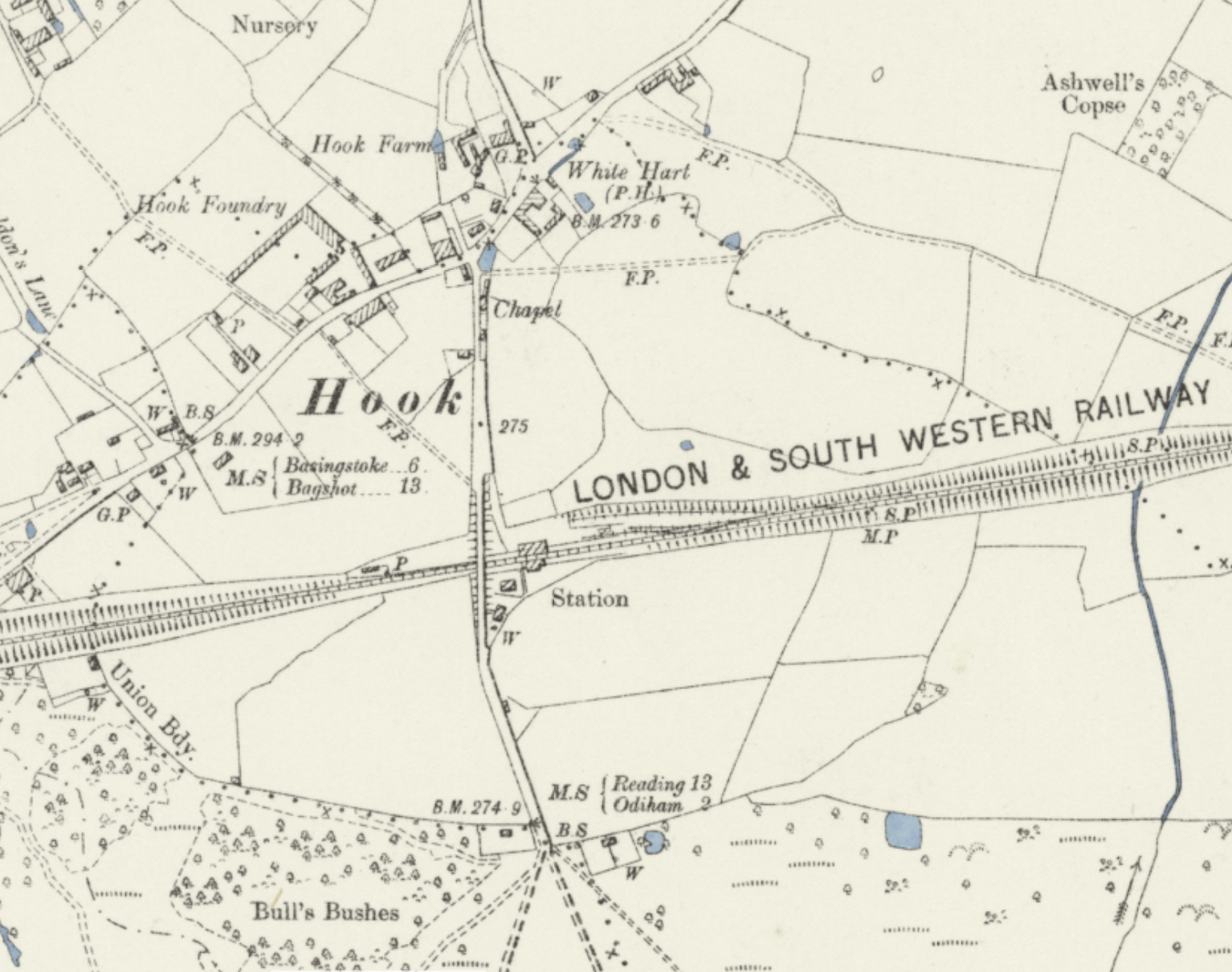 Ordnance Survey map of Hook from 1888-1915 showing the London and South Western Railway, Hook Station, the White Hart pub, and milestone marker